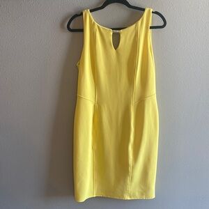 Figure flattering yellow dress. Great for that summer wedding.
